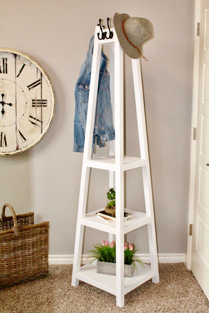 DIY Coat Rack featuring black hooks to hang coats for the home entryway